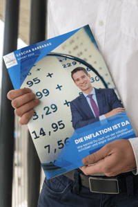 mockup-of-a-formal-man-holding-a-magazine-3388-el1-min